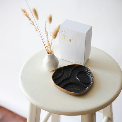 Handcrafted, ceramic soap square holder in graphite colour with soap square in the background